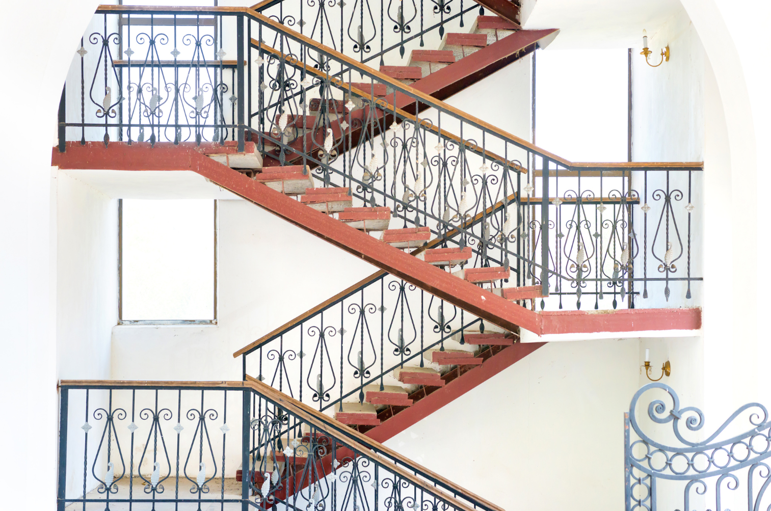 Industrial-style commercial staircase with metal railings